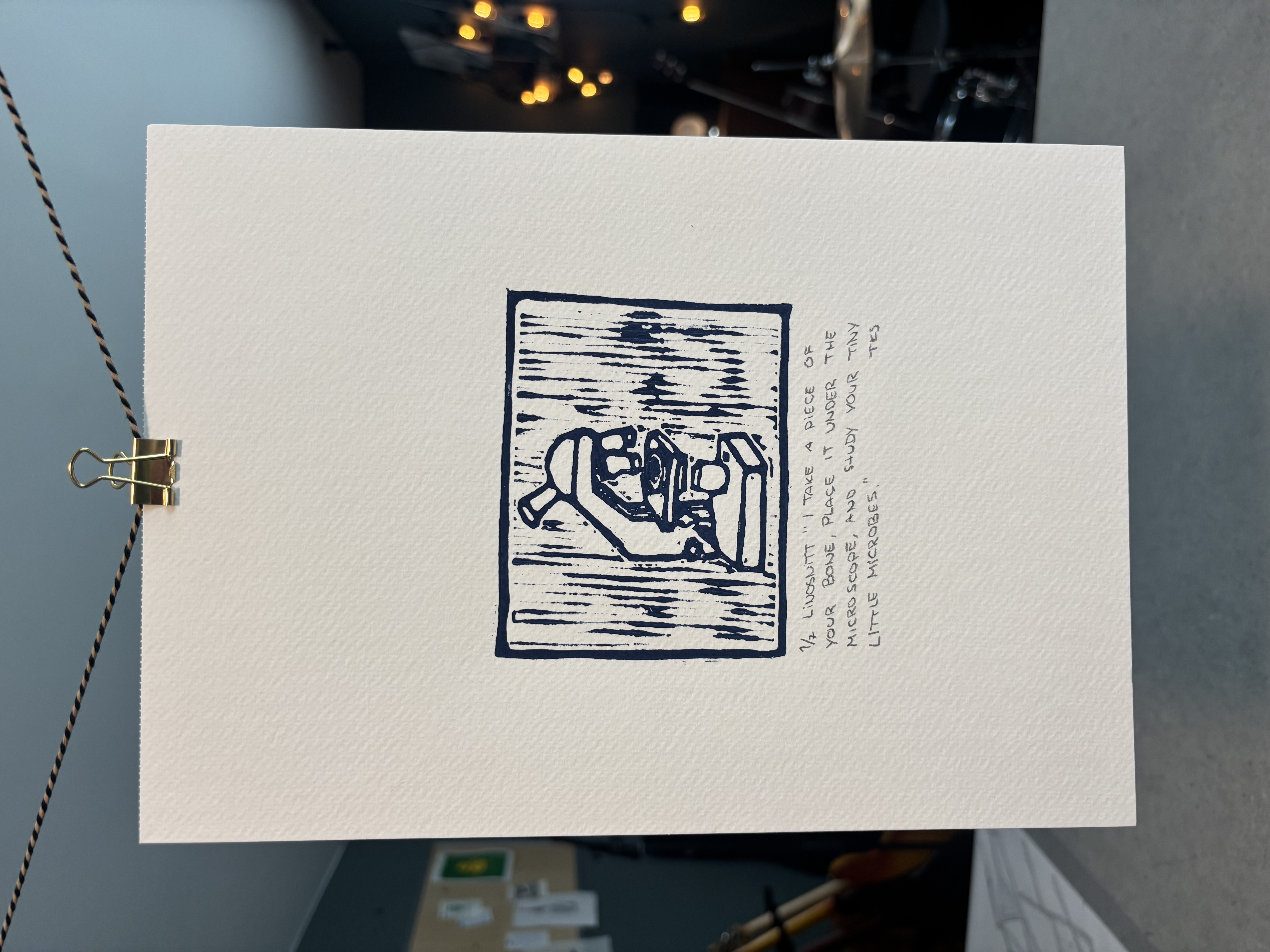 Skeleton — lino print with microscope